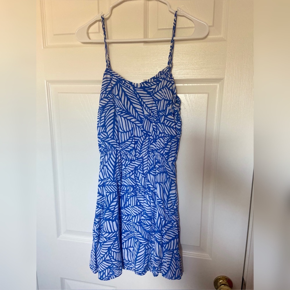 Tropical blue dress ties in back